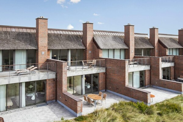 Foto van 8 persoons vakantie huis op een vakantie park in Rømø - Outdoor