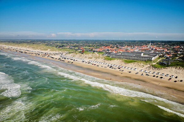 Foto van 8 persoons vakantie huis op een vakantie park in Blokhus - Outdoor