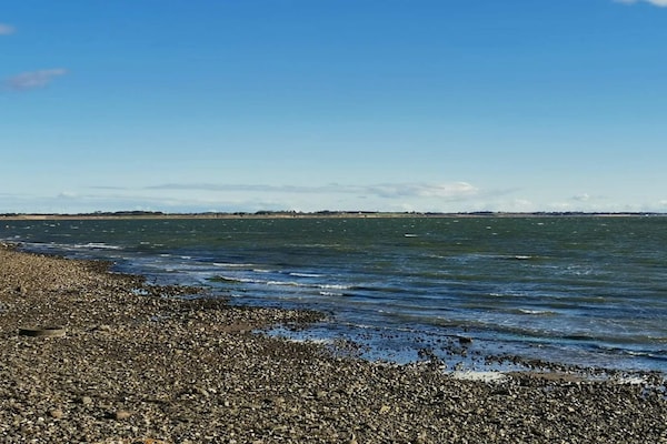 Foto van Luxe zwembadvilla in Marielyst -- By Traum Ferienwohnungen - WaterView