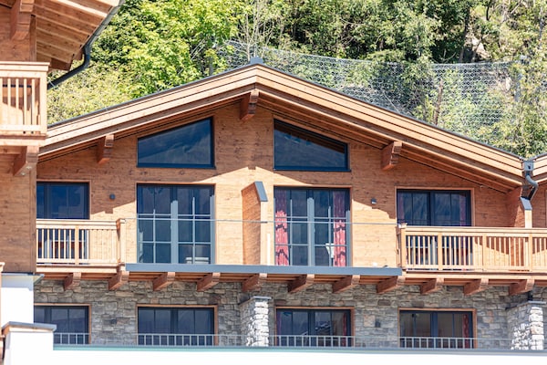 Foto van Luxe chalet met prive sauna, nabij een zwemmeer - Vakantiehuis in Uttendorf - ExteriorSummer