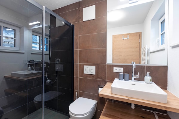 Foto van Luxe chalet met prive sauna, nabij een zwemmeer - Vakantiehuis in Uttendorf - BathRoom