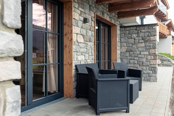 Foto van Luxe chalet met prive sauna, nabij een zwemmeer - Vakantiehuis in Uttendorf - TerraceBalcony