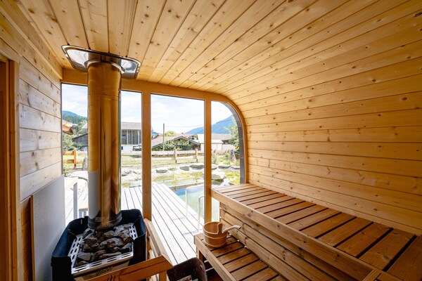 Foto van Boerderij in Bramberg met Natuurlijke Vijver - Vakantiehuis in Bramberg - Wellness