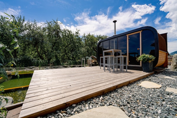 Foto van Boerderij in Bramberg met Natuurlijke Vijver - Vakantiehuis in Bramberg - Wellness