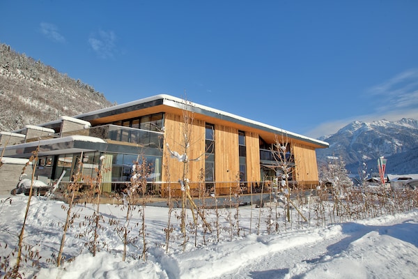 Foto van Appartement in Neukirchen bij Skilift - Vakantiehuis in Neukirchen am Großvenediger - ExteriorWinter