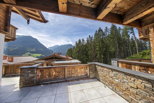 Foto van Alpine Chalet met Ski-In toegang - Vakantiehuis in Neukirchen - ViewSummer