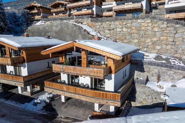Foto van Chalet vlakbij skilift met tuin - Vakantiehuis in Neukirchen - ExteriorWinter