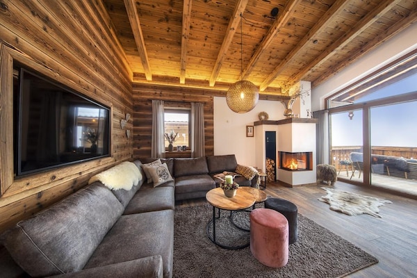 Foto van Chalet in Neukirchen bij Wildkogel Piste - Vakantiehuis in Neukirchen am Grossvenediger - LivingRoom