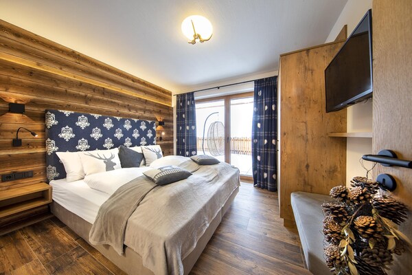 Foto van Chalet in Neukirchen bij Wildkogel Piste - Vakantiehuis in Neukirchen am Grossvenediger - BedRoom