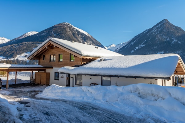 Foto van Chalet in Neukirchen bij Wildkogel-pistes - Vakantiehuis in Neukirchen am Großvenediger - ExteriorWinter