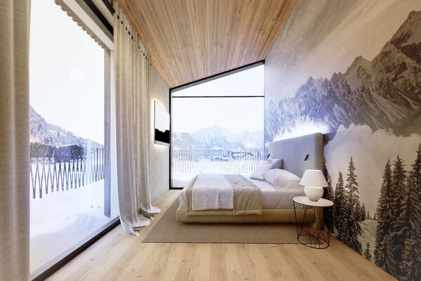 Foto van Appartement met 3 slaapkamers, sauna en balkon - Vakantiehuis in Söll - BedRoom