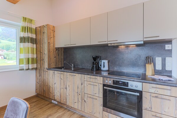 Foto van Appartement Brixen bij Skilift - Vakantiehuis in Brixen im Thale - Kitchen