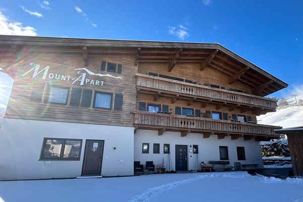 Foto van Gezellig appartement vlakbij Jochberg Centrum - Vakantiehuis in Jochberg - ExteriorWinter