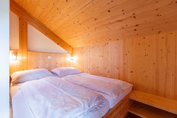 Foto van Luxe chalet in Sankt Georgen met jacuzzi - Vakantiehuis in Sankt Georgen am Kresichberg - BedRoom