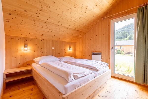 Foto van Luxe chalet in Sankt Georgen met jacuzzi - Vakantiehuis in Sankt Georgen am Kresichberg - BedRoom