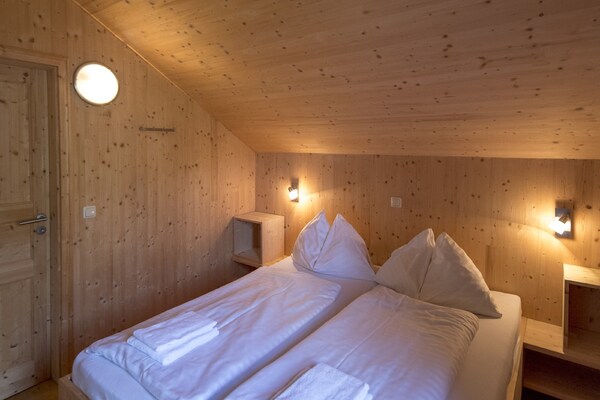 Foto van chalet met infraroodsauna en whirlpool - Vakantiehuis in Kreischberg Murau - BedRoom