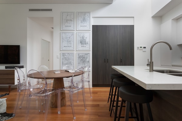 Foto van Stijlvol appartement met 2 slaapkamers en barbecueterras vlakbij het strand - DiningRoom