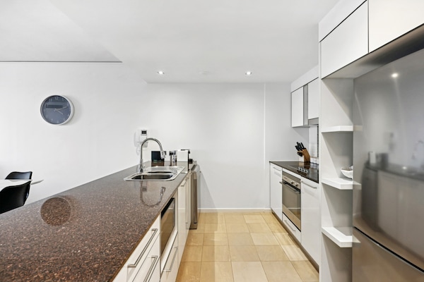 Foto van Appartement met 3 slaapkamers, uitzicht op de oceaan, fitnessruimte en zwembad - Kitchen