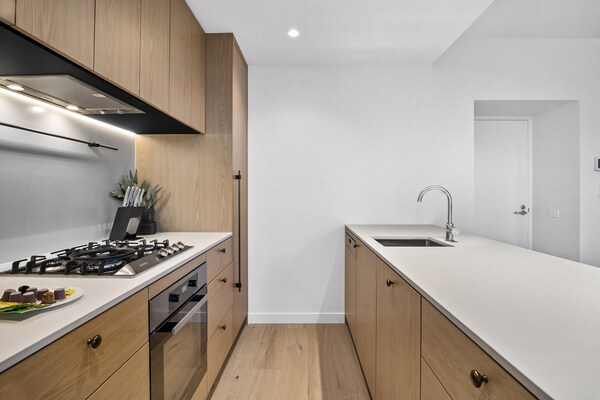 Foto van Stijlvol appartement met 2 slaapkamers en moderne voorzieningen. - Kitchen