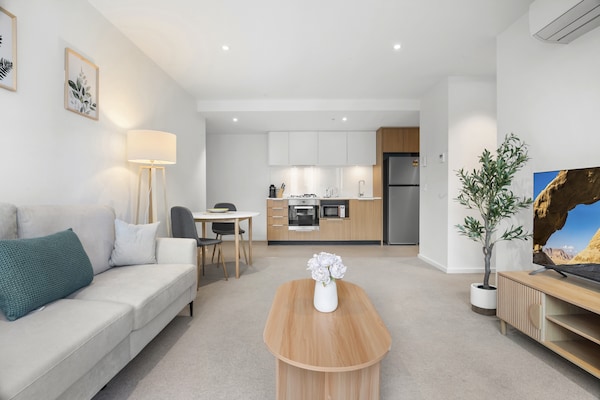 Foto van Appartement met 1 slaapkamer en uitzicht op de jachthaven in Docklands - LivingRoom