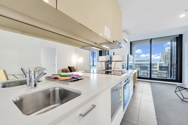 Foto van Appartement met 1 slaapkamer in een hoogbouwcomplex vlakbij Southern Cross. - Kitchen