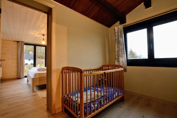 Foto van Chalet met panoramisch uitzicht en omheinde tuin - Vakantiehuis in Tenneville - BedRoom