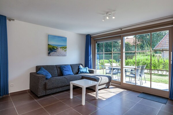 Foto van Prachtig vakantiehuis in Adinkerke met een omheind terras - LivingRoom