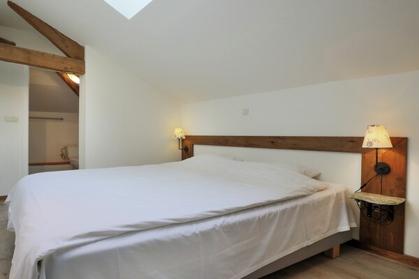 Foto van Luxe woning in Gouvy met zwembad en sauna - Vakantiehuis in Houffalize - BedRoom