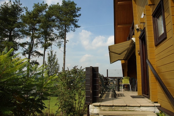 Foto van Chalet in Durbuy met Sauna & Uitzicht - Vakantiehuis in Durbuy - TerraceBalcony