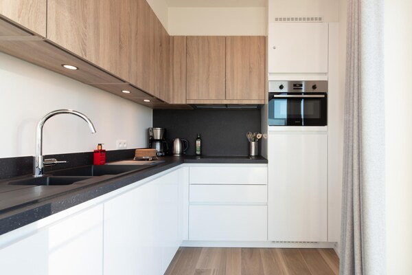 Foto van Stijlvol appartement met terras in Bredene - Vakantiehuis in Bredene - Kitchen