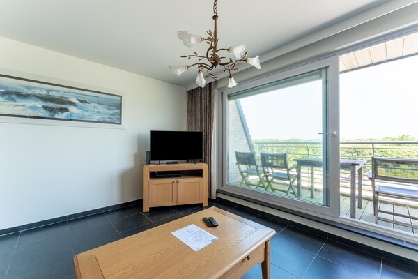 Foto van Helder Kustverblijf in Bredene - Vakantiehuis in Bredene - LivingRoom