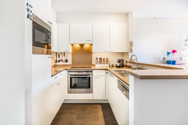 Foto van Appartement aan de kust met zonneterras - Vakantiehuis in Oostduinkerke - Kitchen
