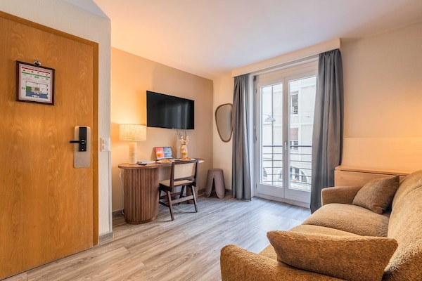 Foto van Appartement moderne - AC-1BR-4P- Genève - Vakantiehuis in Genève - LivingRoom