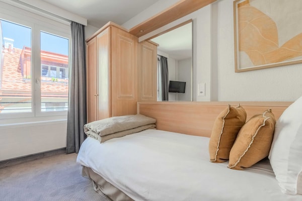 Foto van Appartement moderne - AC-1BR-4P- Genève - Vakantiehuis in Genève - LivingRoom