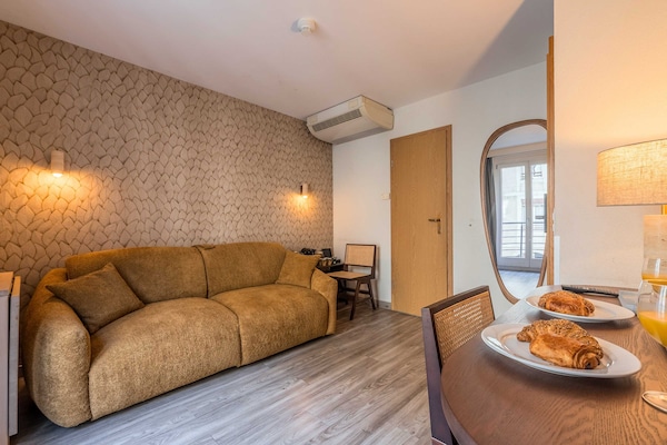 Foto van Appartement moderne - AC-1BR-4P- Genève - Vakantiehuis in Genève - LivingRoom
