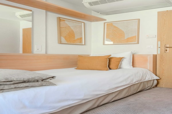 Foto van Appartement moderne - AC-1BR-4P- Genève - Vakantiehuis in Genève - LivingRoom