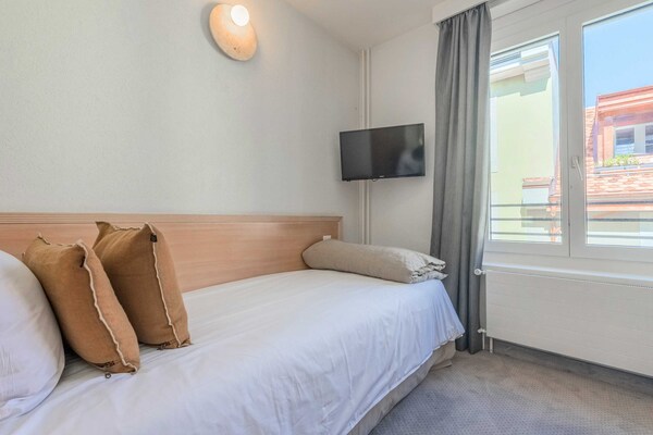 Foto van Appartement moderne - AC-1BR-4P- Genève - Vakantiehuis in Genève - LivingRoom