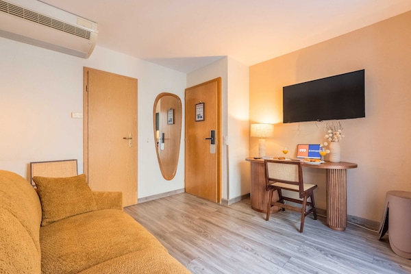 Foto van Appartement moderne - AC-1BR-4P- Genève - Vakantiehuis in Genève - LivingRoom
