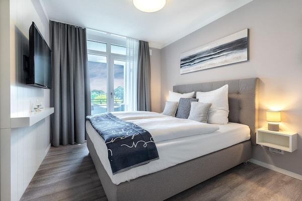 Foto van Appartement met loggia en uitzicht op het park - Vakantiehuis in Travemünde - BedRoom