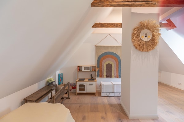 Foto van rietgedekte vakantiewoning met tegelkachel - Vakantiehuis in Tetenbüll - BedRoom