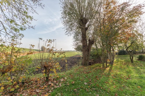 Foto van rietgedekte vakantiewoning met tegelkachel - Vakantiehuis in Tetenbüll - GardenSummer