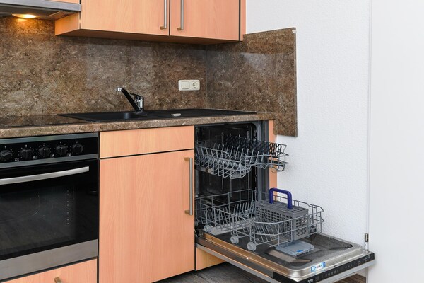 Foto van Licht vakantieapt voor twee personen in Bensersiel - Kitchen