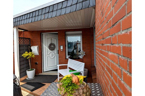 Foto van Bungalow mit Kamin in Dornumersiel - Vakantiehuis in Dornumersiel - ExteriorSummer