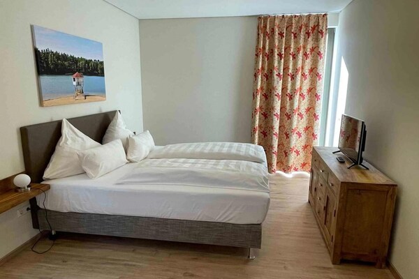 Foto van Bernsteinsee Homes en Ferien Beach House 2 - Vakantiehuis in Sassenburg - BedRoom