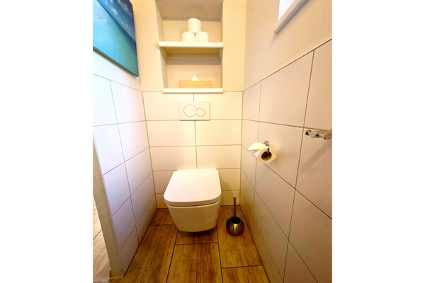 Foto van Bernsteinsee Homes en Ferien Beach House 2 - Vakantiehuis in Sassenburg - BathRoom