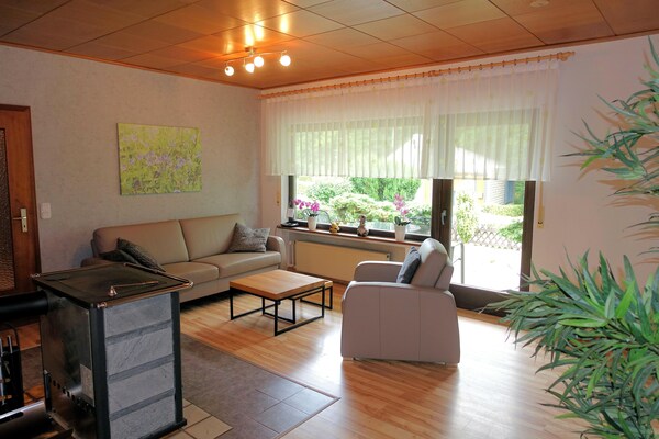 Foto van Feusdorf Bosbungalow - Vakantiehuis in Feusdorf - LivingRoom