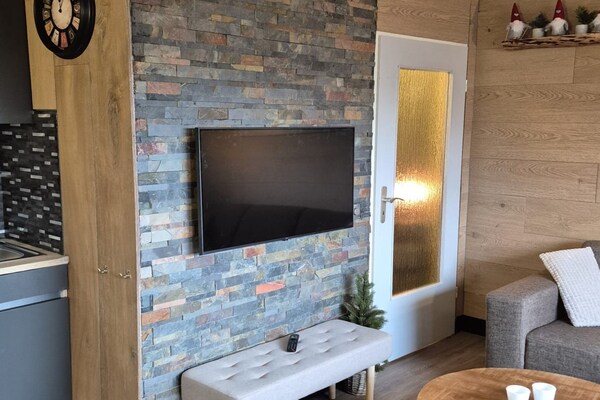 Foto van Appartement met uitzicht op de bergen nabij Winterberg - LivingRoom