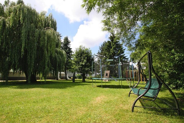 Foto van Prachtig vakantiehuis met terras - Vakantiehuis in Sommersdorf - GardenSummer