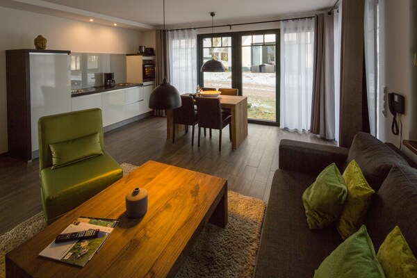 Foto van Twee-onder-een-kapwoningen in het natuurresort Drewitz - LivingRoom