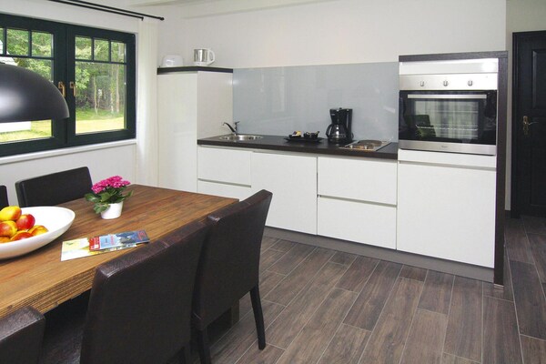 Foto van Twee-onder-een-kapwoningen in het natuurresort Drewitz - DiningRoom